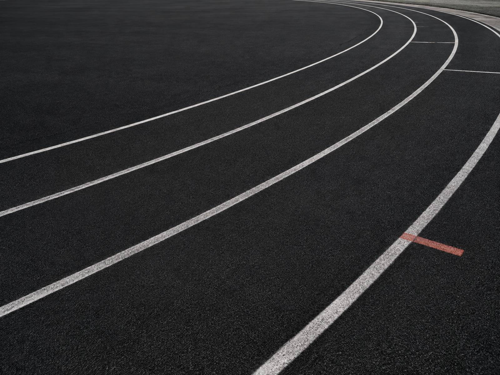 Curved lanes of an empty running track